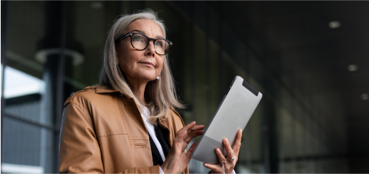 a woman holding a piece of paper