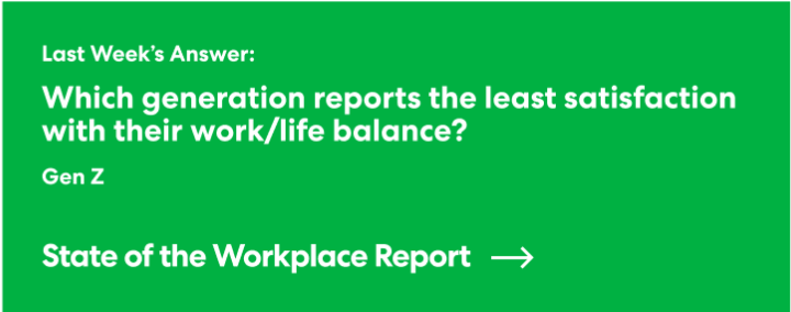 two women looking at a laptop