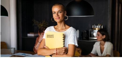 a person holding a notebook